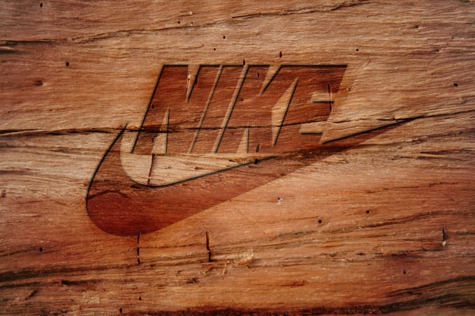 I will carve in wood your logo or text