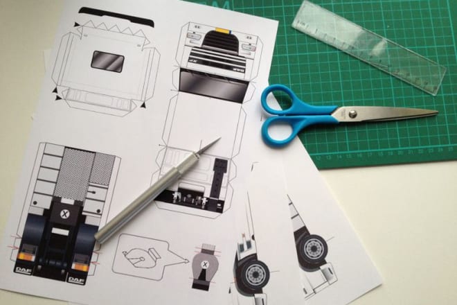 I will design a custom made paper model with your logo on it