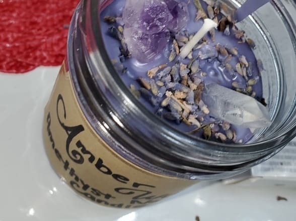 I will make you a crystal embedded spell candle for your specific need