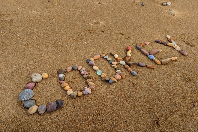 I will create a wonderful photo using stones in the beach with your message