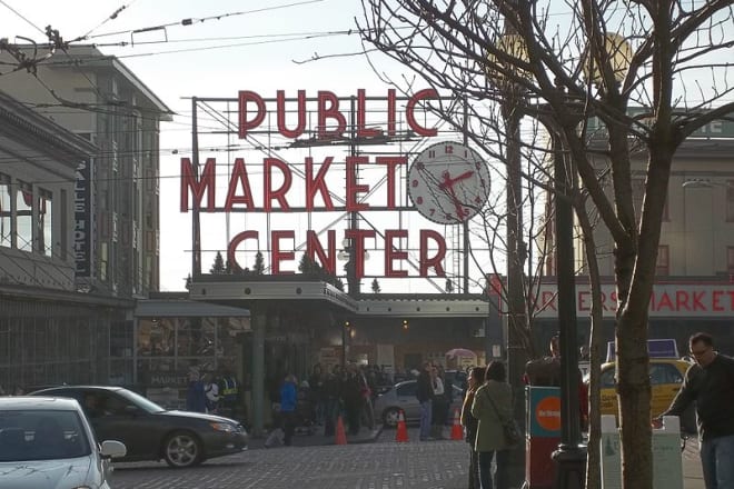 I will hand out 50 flyers at Pike Place Market in Seattle